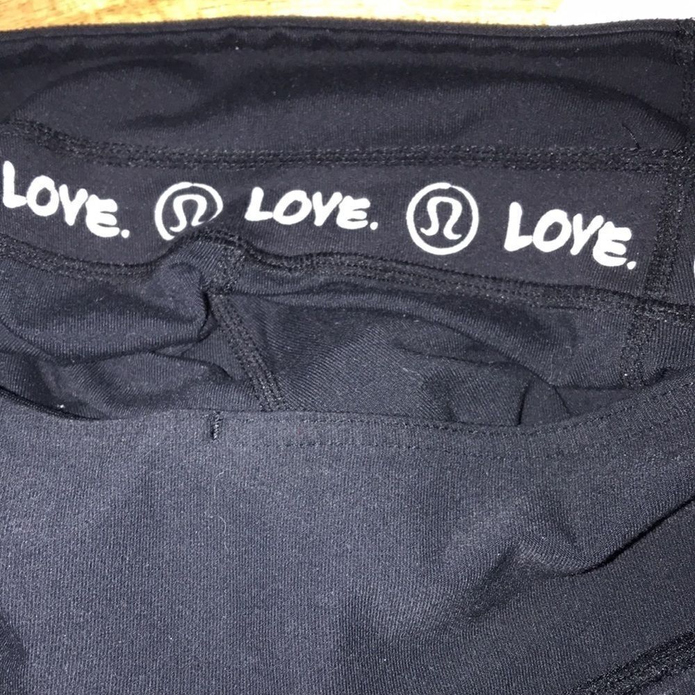 Lululemon Black Cropped High Rise Flare Leggings Reflective Logo‎ Womens